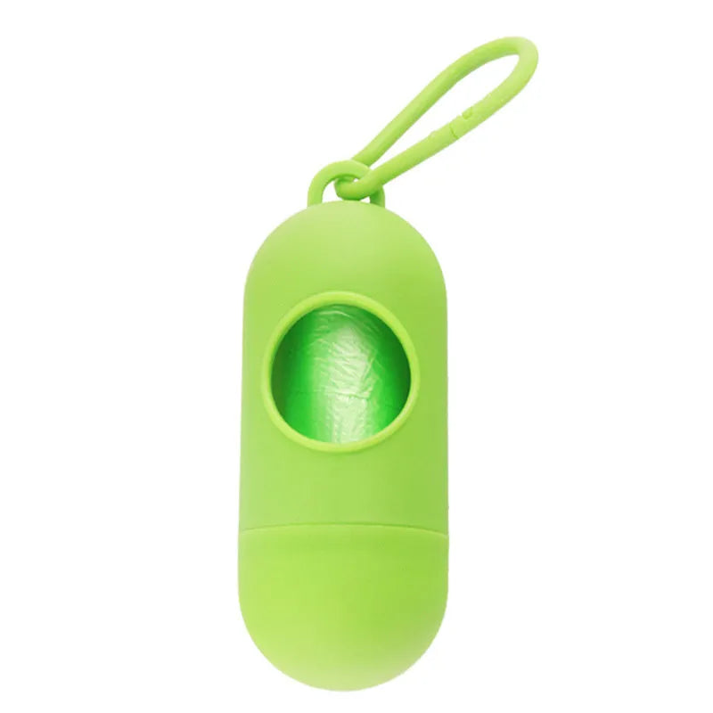 Small, lightweight dog poop bag holder showing side hook and Velcro strap for attachment.
