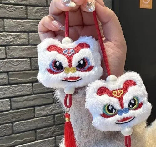 Blue Chinese style plush lion keychain ornament with star stone details and tassel