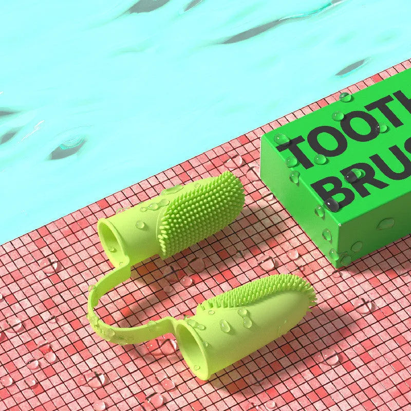 TPR pet tooth cleaning finger cover in blue green, pink, or grass yellow for manual dental care.