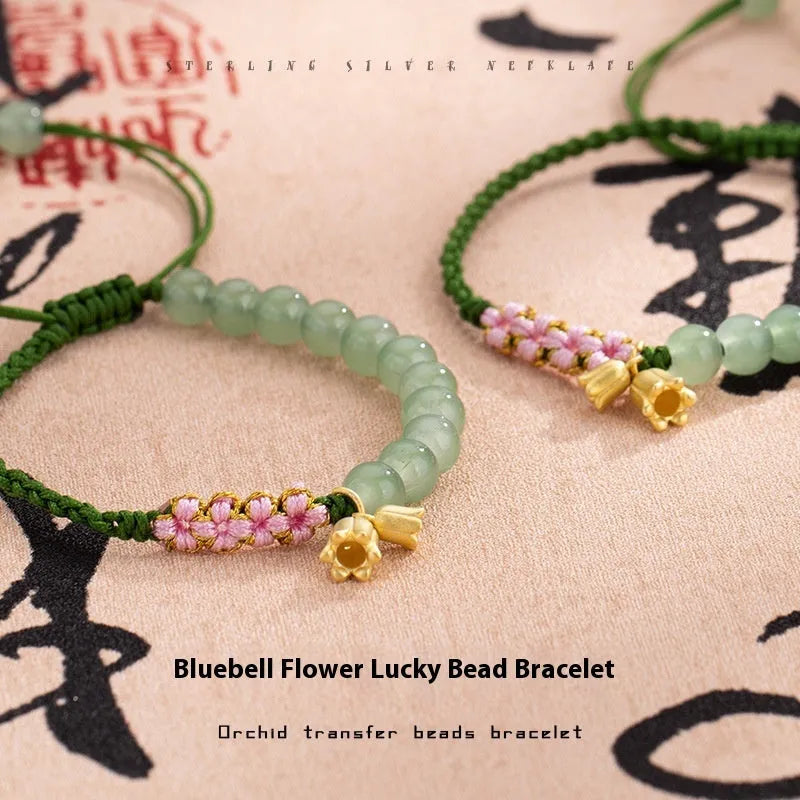Hand woven red rope bracelet with flower decorations in national style women's design