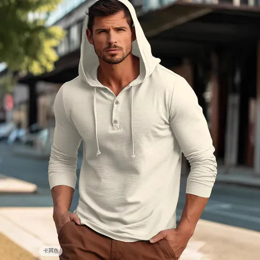 A dark blue cotton pullover hoodie with long sleeves on a hanger.