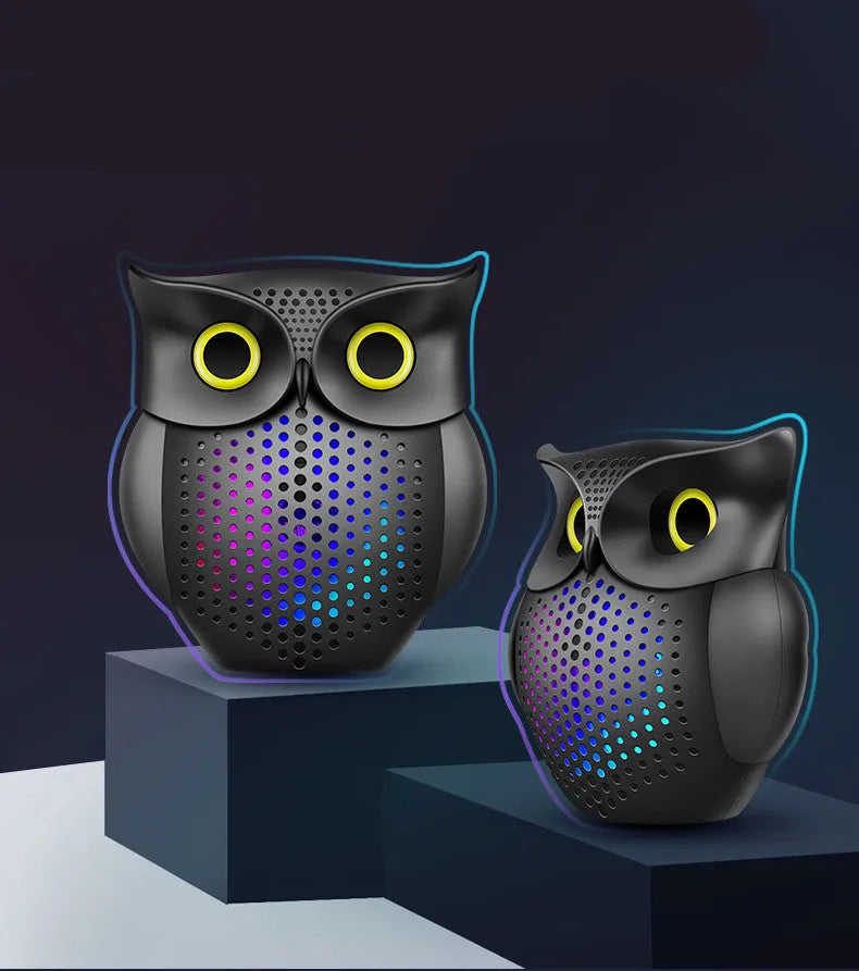 Black wireless Bluetooth speaker with cartoon owl design, compact size