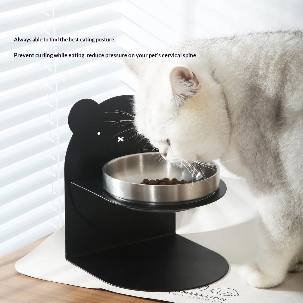 Inclined stainless steel cat feeding bowl on black magnetic stand with bear design