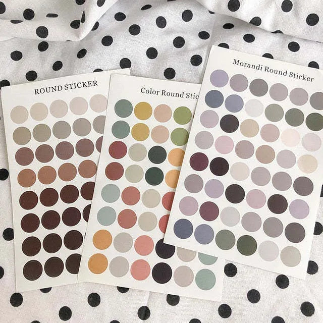 Sheet of 48 Morandi earth colour polka dot seal stickers, each 2cm diameter, on a 16x24.5cm sheet