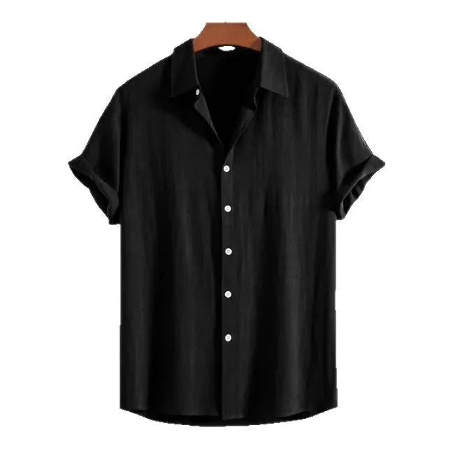 A man wearing a loose-fitting, solid-colour short-sleeve cardigan suitable for summer.