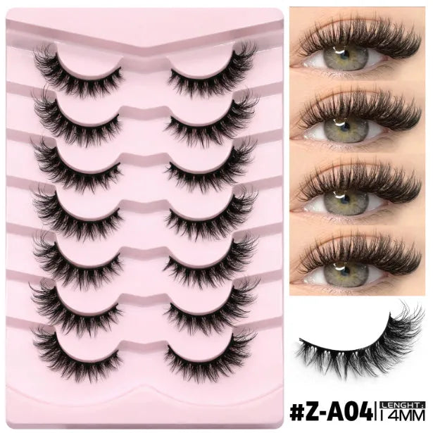 Box of natural false eyelashes with thick artificial fibre lashes and glue tube