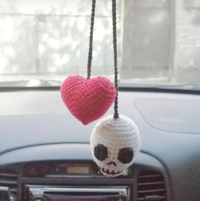 Plush hand-woven car hanging ornament in a cartoon design, made from soft polyester fabric.
