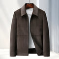 Men's slim-fit lapel casual jacket in dark blue, shown on a model.
