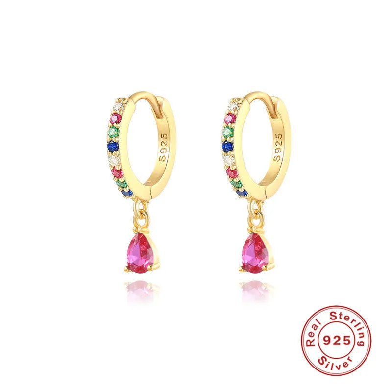 S925 sterling silver water drop shaped earrings with a gemstone accent on a gold or silver background.