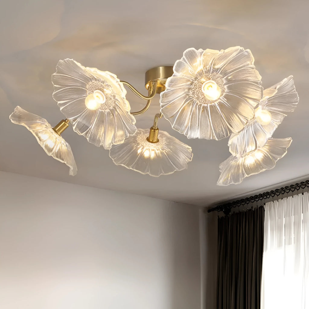 Modern white flower ceiling lamp with five heads emitting warm light, mounted on a ceiling.