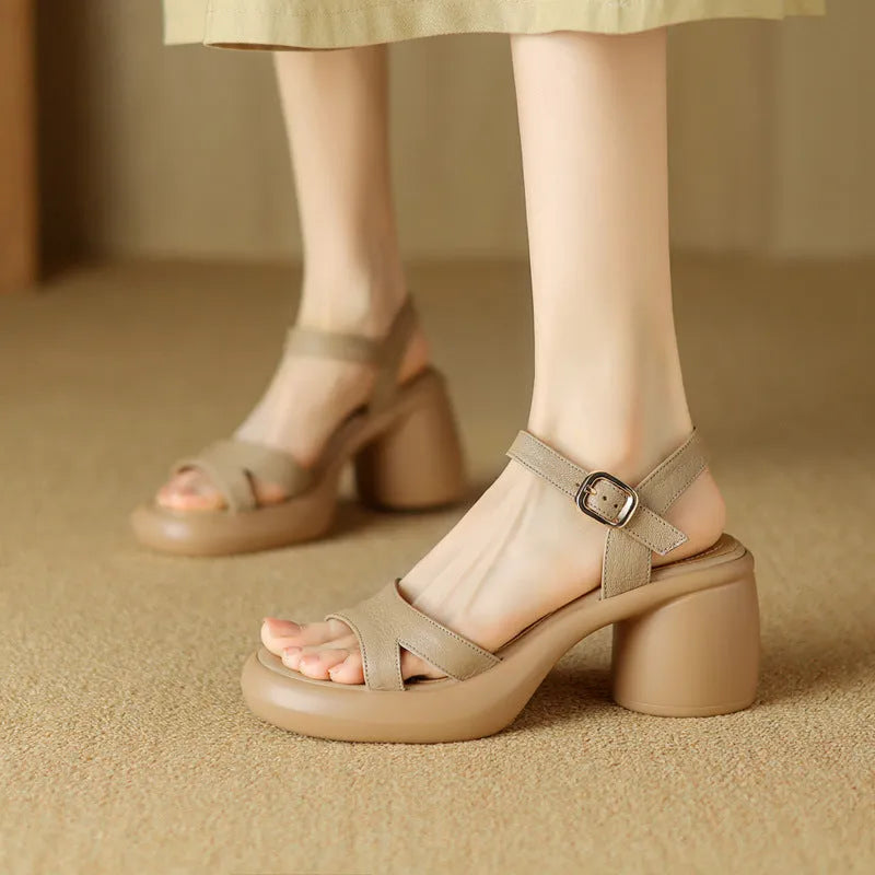 Women's open toe platform sandals in apricot with a round toe holder and a thick light-brown rubber sole.