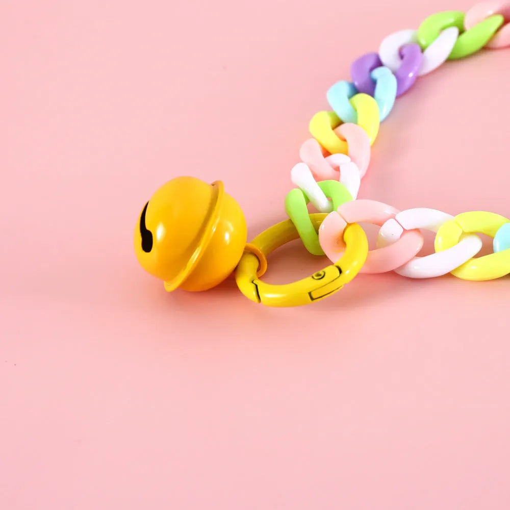 Adjustable plastic pet collar in candy chain blue colour on a white background, showing the monochrome pattern.