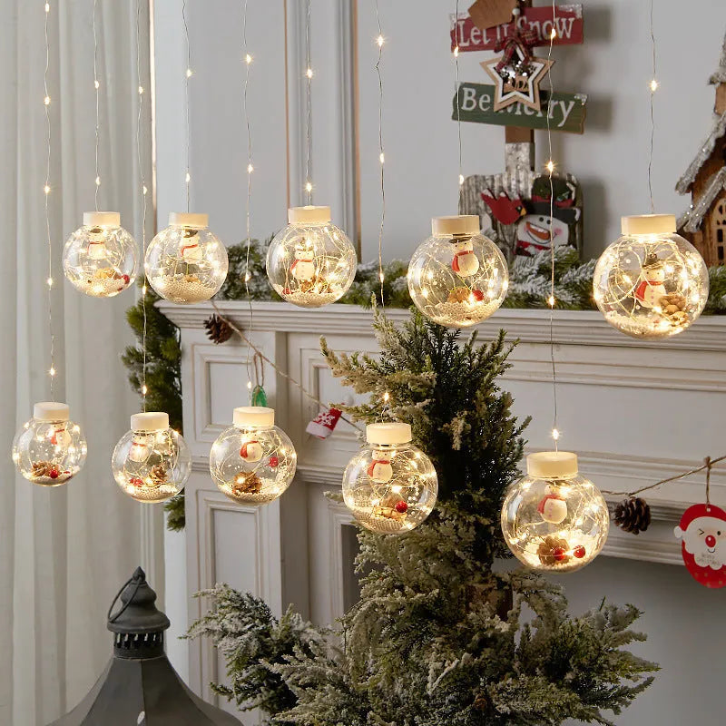 10-piece LED Christmas curtain light string with fairy, snowman and wishing ball decorations for windows