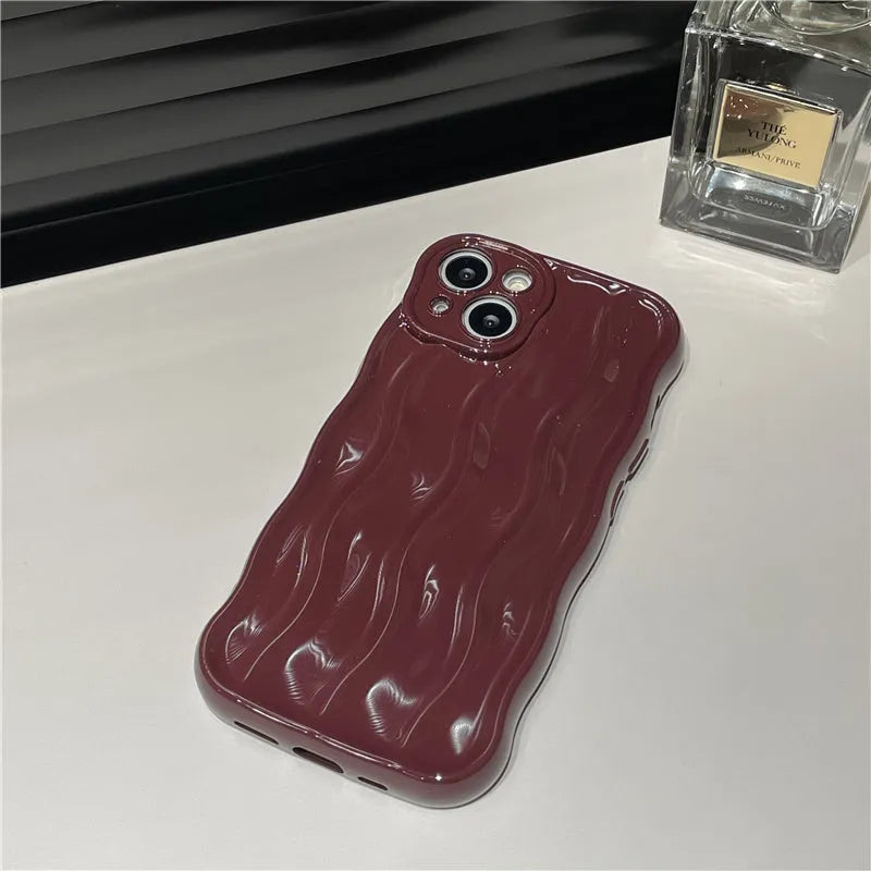 Silicone iPhone 17 case with water ripple pattern in green colour showing front and back views