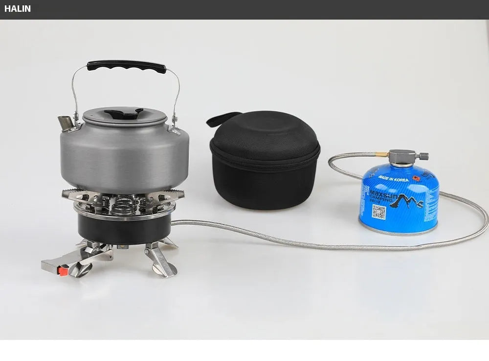 Silver portable split camping stove with folded legs and a 100cm gas hose on a wooden table.