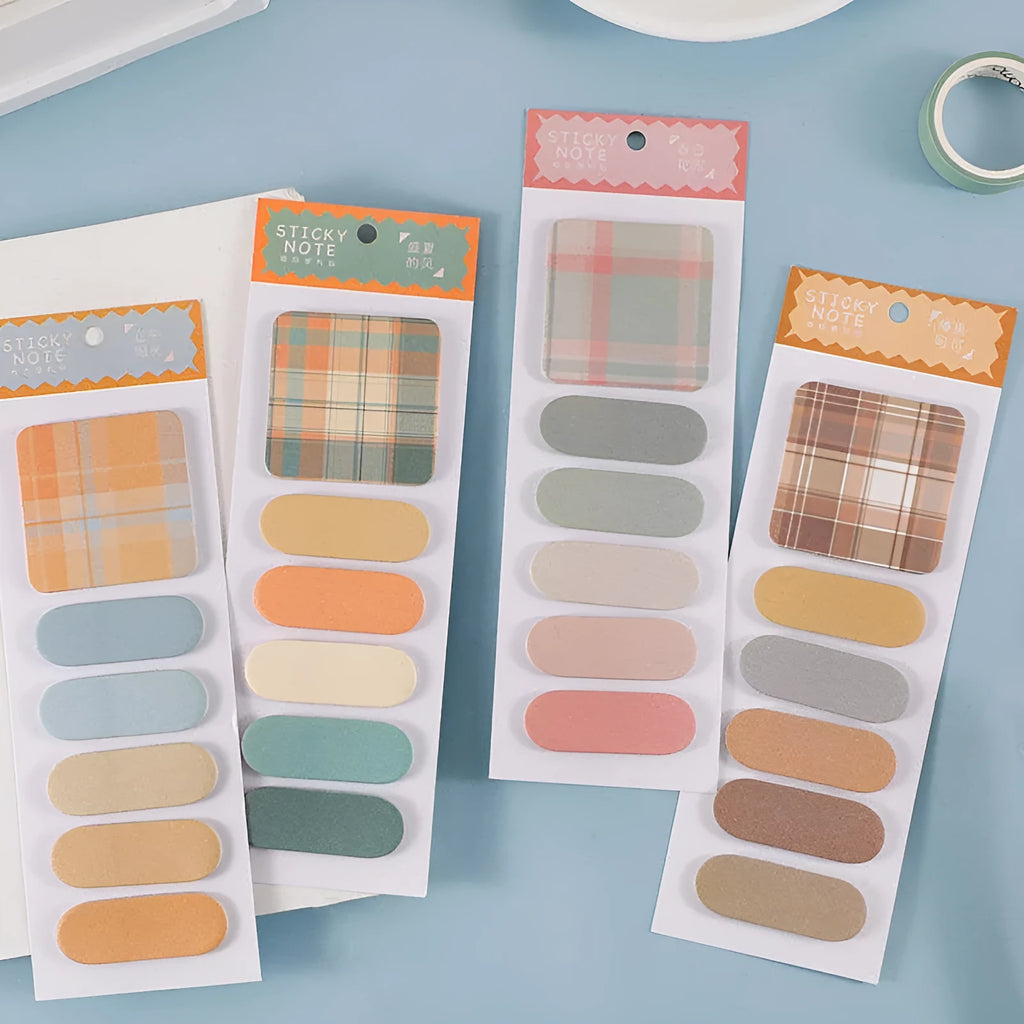Colourful memo pad pack of sticky notes showing various cover colour options including blue, pink, and green.