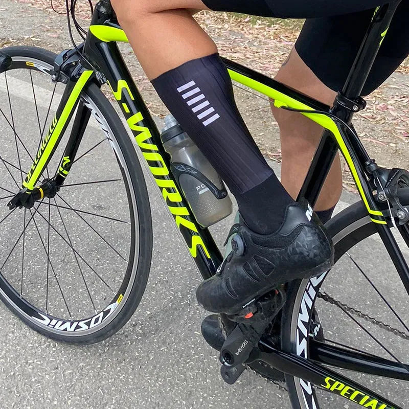 A pair of breathable athletic sports socks for cycling and running, available in six colours.