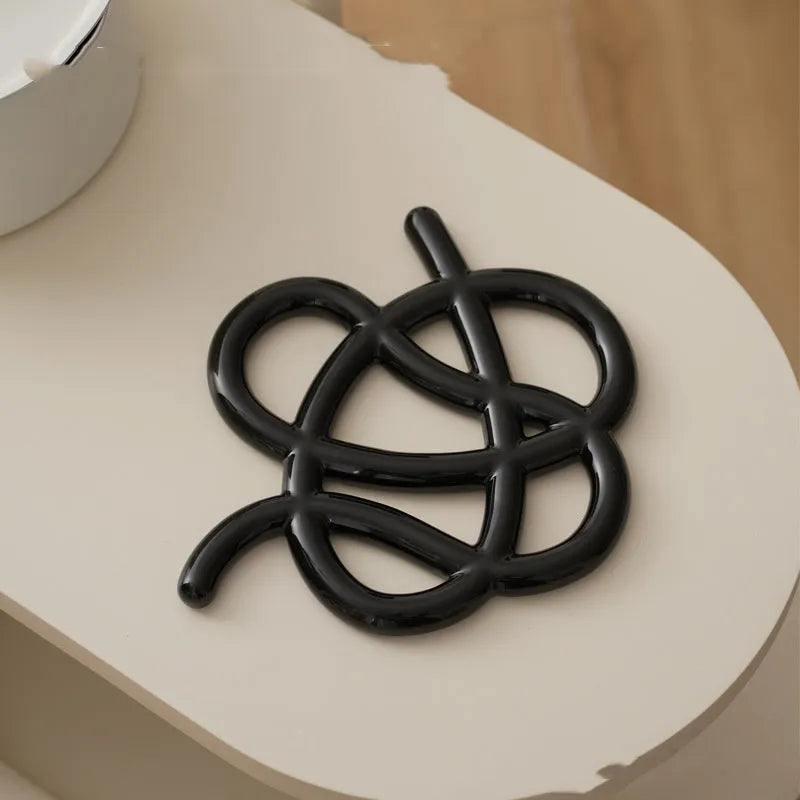 Ceramic heat proof dining table cushion mat in solid colour with irregular shape design