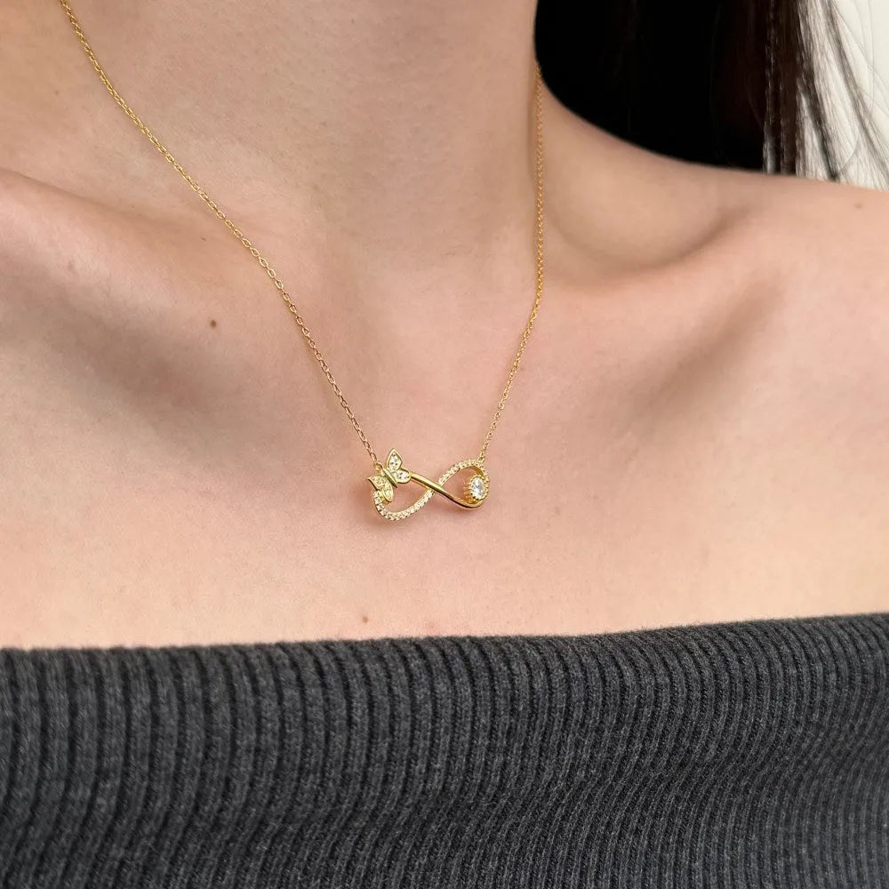 Mobius bow zircon clavicle chain 925 silver electroplated platinum finish butterfly motif