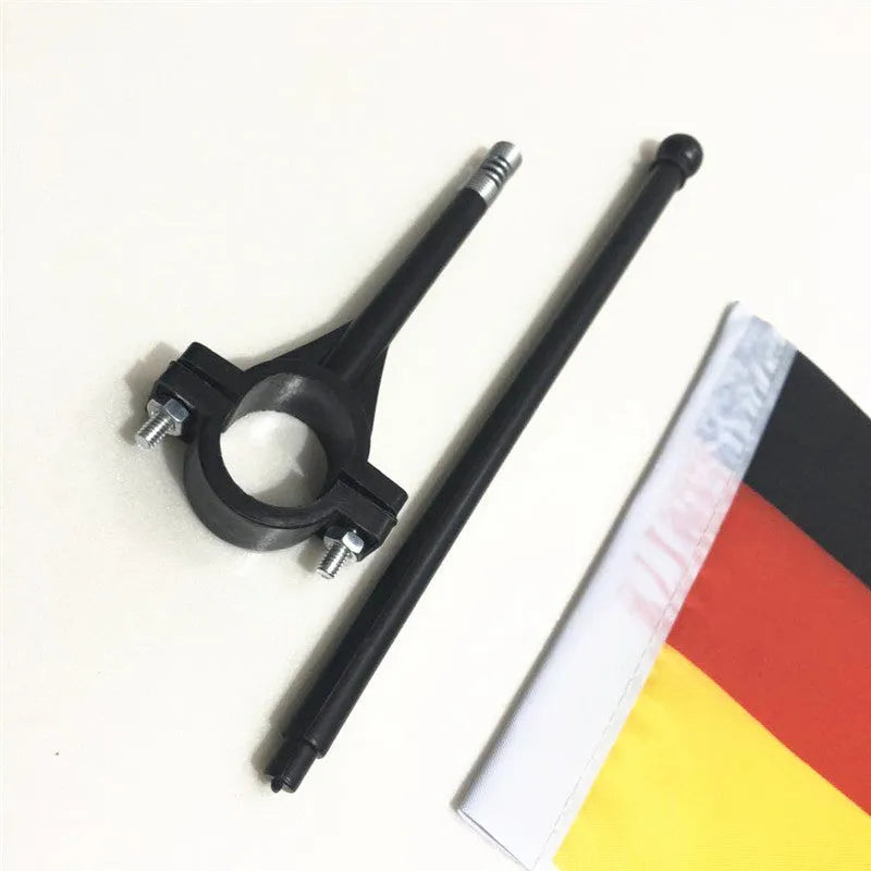 A square polyester flag on a plastic pole, designed for attachment to a bicycle handlebar.