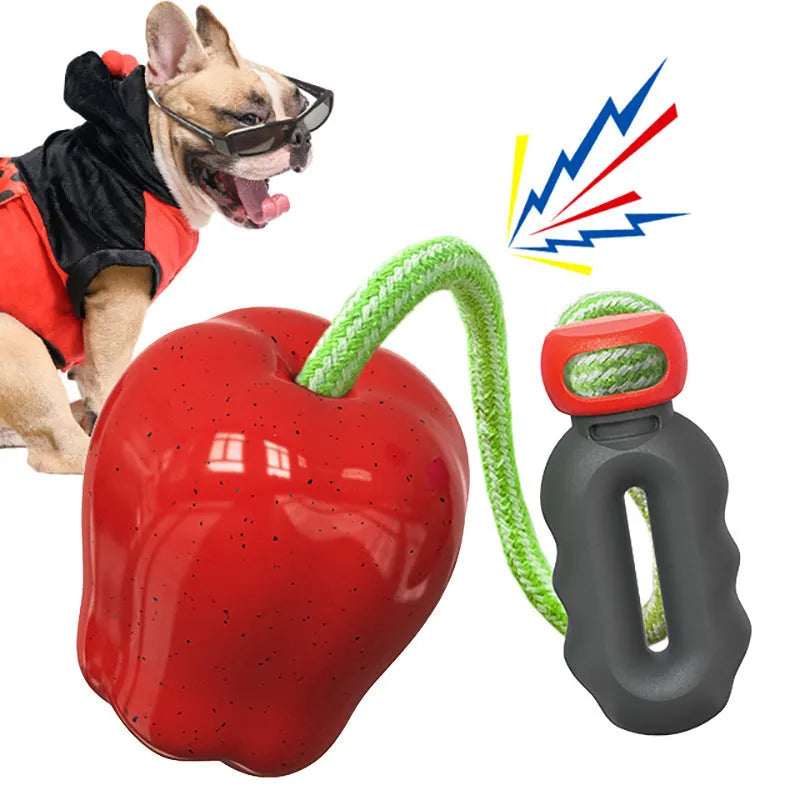 Green and red plastic squeaky apple dog toys with dropping ball design for dental care and interactive play