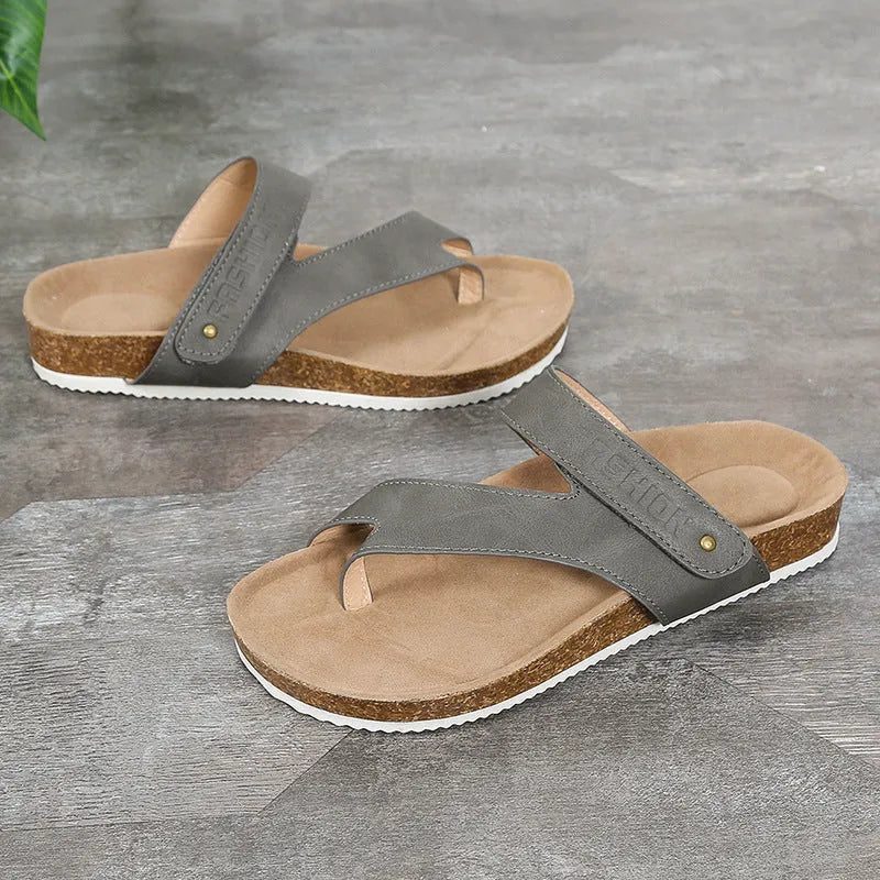 Flat toe ring thick-soled flip-flops in blue, showing foam sole and PU upper.