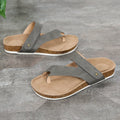 Flat toe ring thick-soled flip-flops in blue, showing foam sole and PU upper.