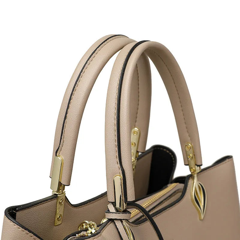 Women's multi-layer shoulder messenger bag in PU material showing compartment design