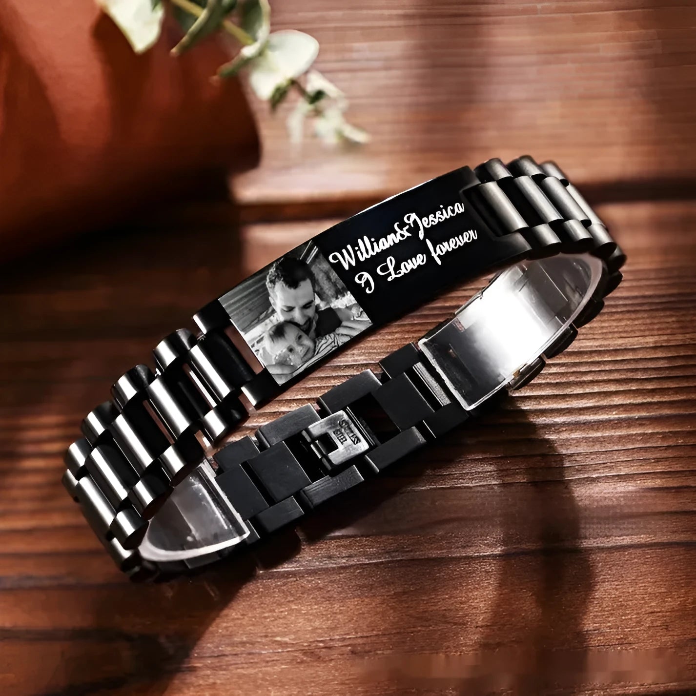 Men's stainless steel bracelet with curved heart design and black lettering in gift box