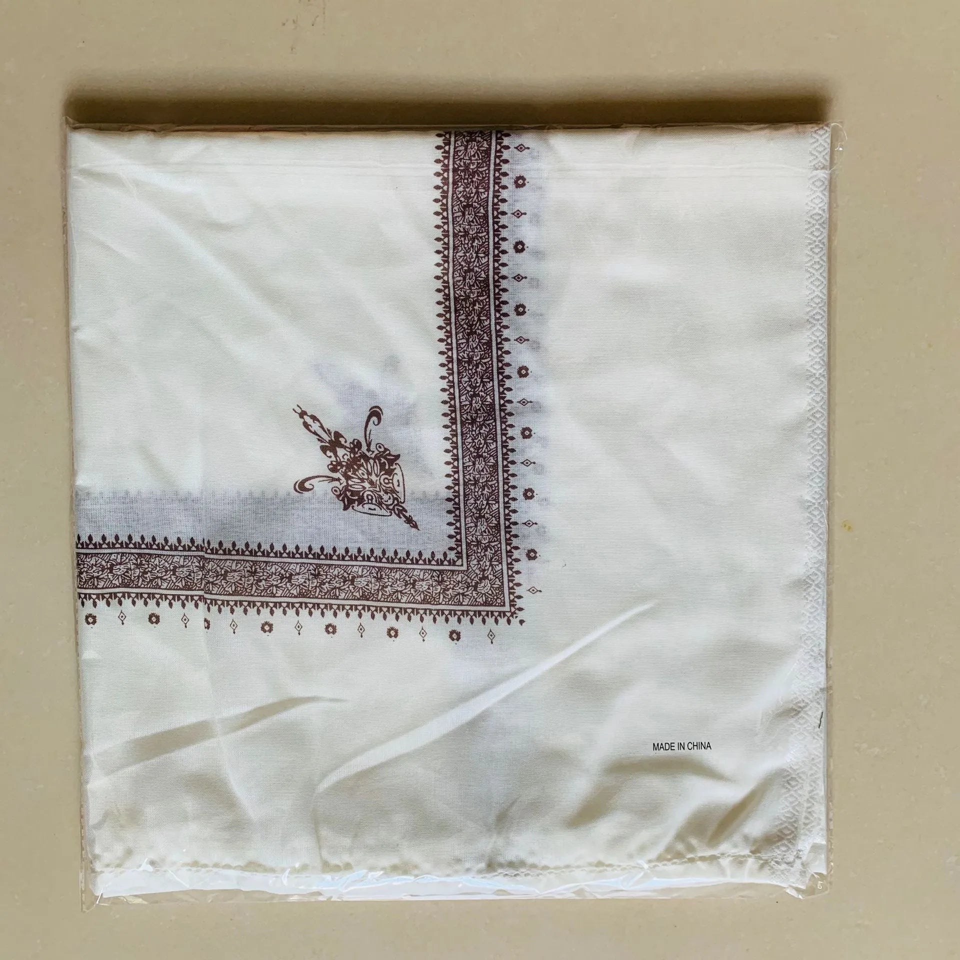 Printed square polyester scarf in various colours showing 138x138 cm dimensions