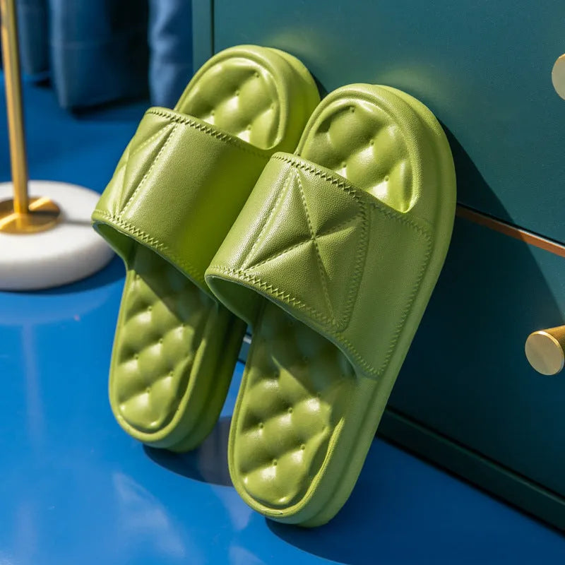 Pair of soft EVA bathroom slippers with a thick non-slip sole, shown in a choice of colours.