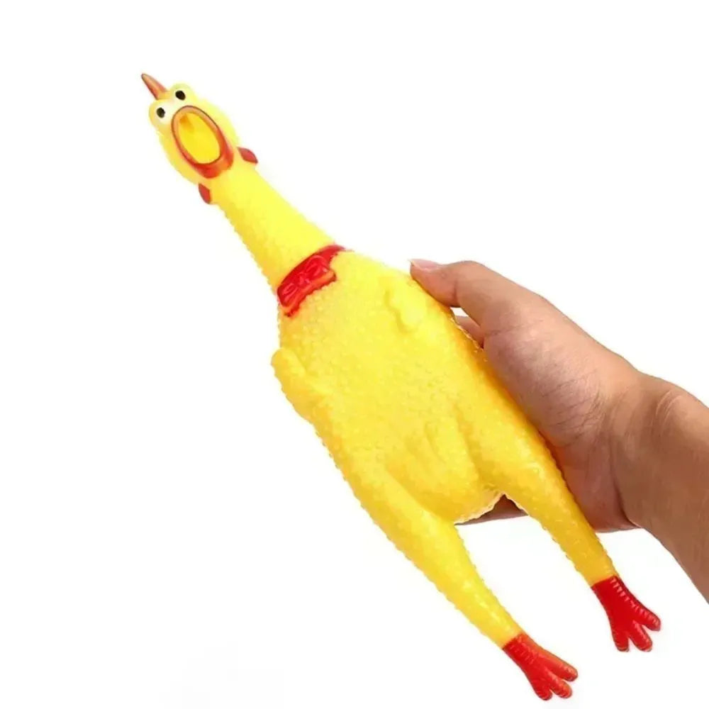 Yellow rubber screaming chicken dog squeak toy with three size options
