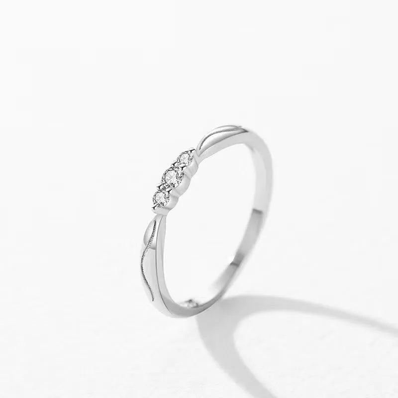 S925 sterling silver ripple wave gang drill small ring on white background, white gold colour texture