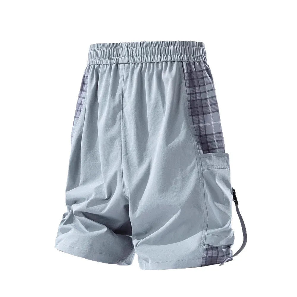 Men's loose-fit cargo shorts with plaid stitching detail in light grey.
