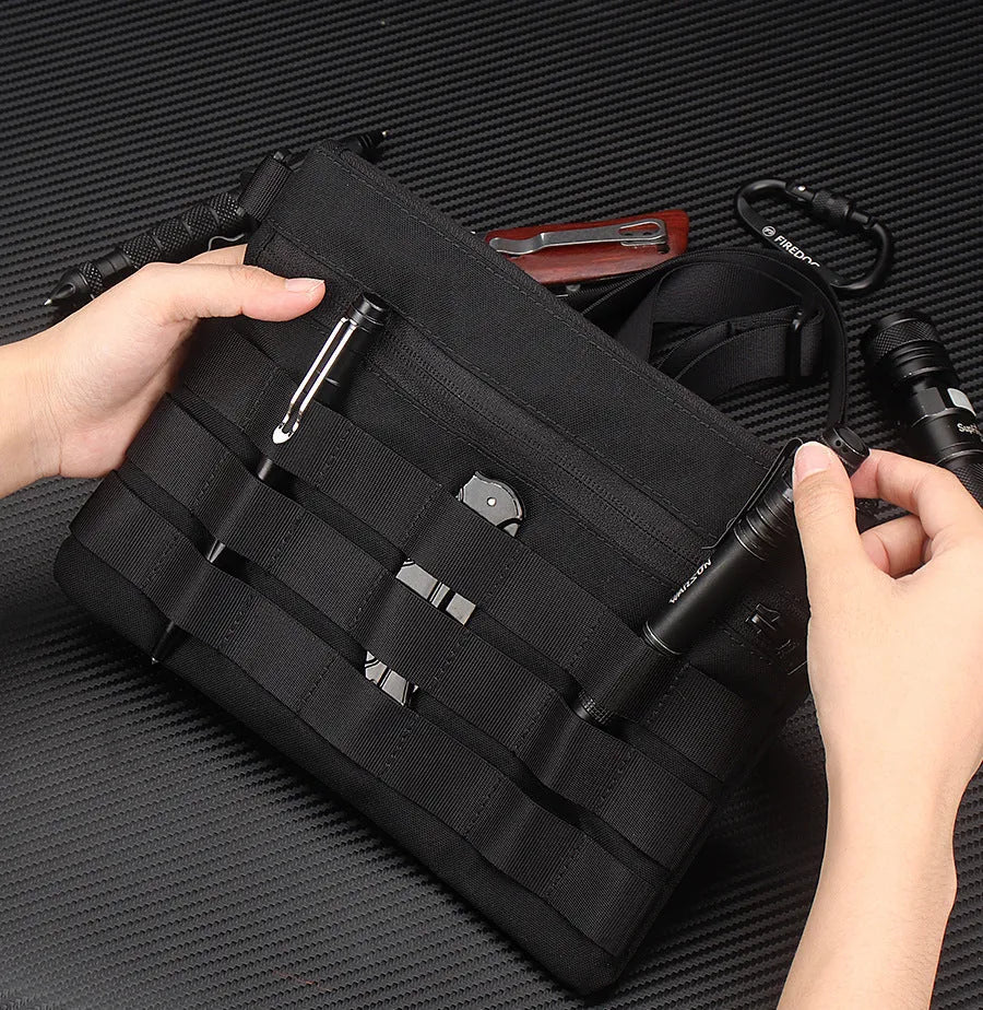 Black Oxford cloth military style outdoor carry bag measuring 18 by 3.5 centimetres