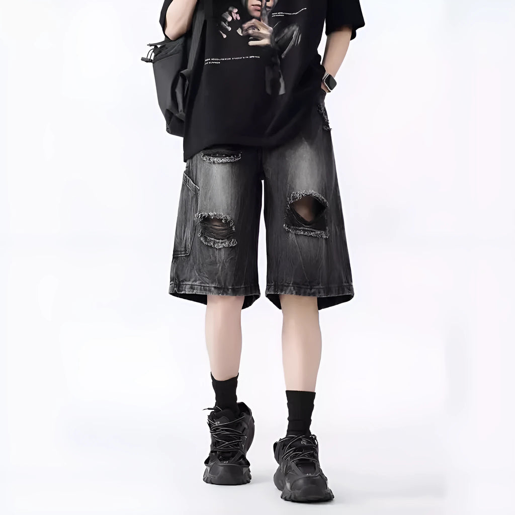 Retro washed denim shorts with loose fit and distressed ripped detailing in black or blue