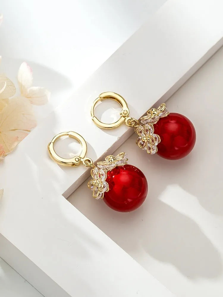 Geometric copper zircon earrings with rose design element in electroplated finish