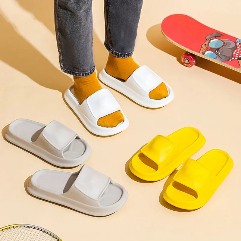 Thick-soled EVA flip flop slippers in multiple colours on a white background.
