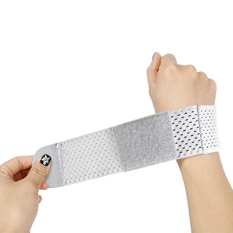 A black elastic breathable wrist guard for athletic sports and gym workouts.
