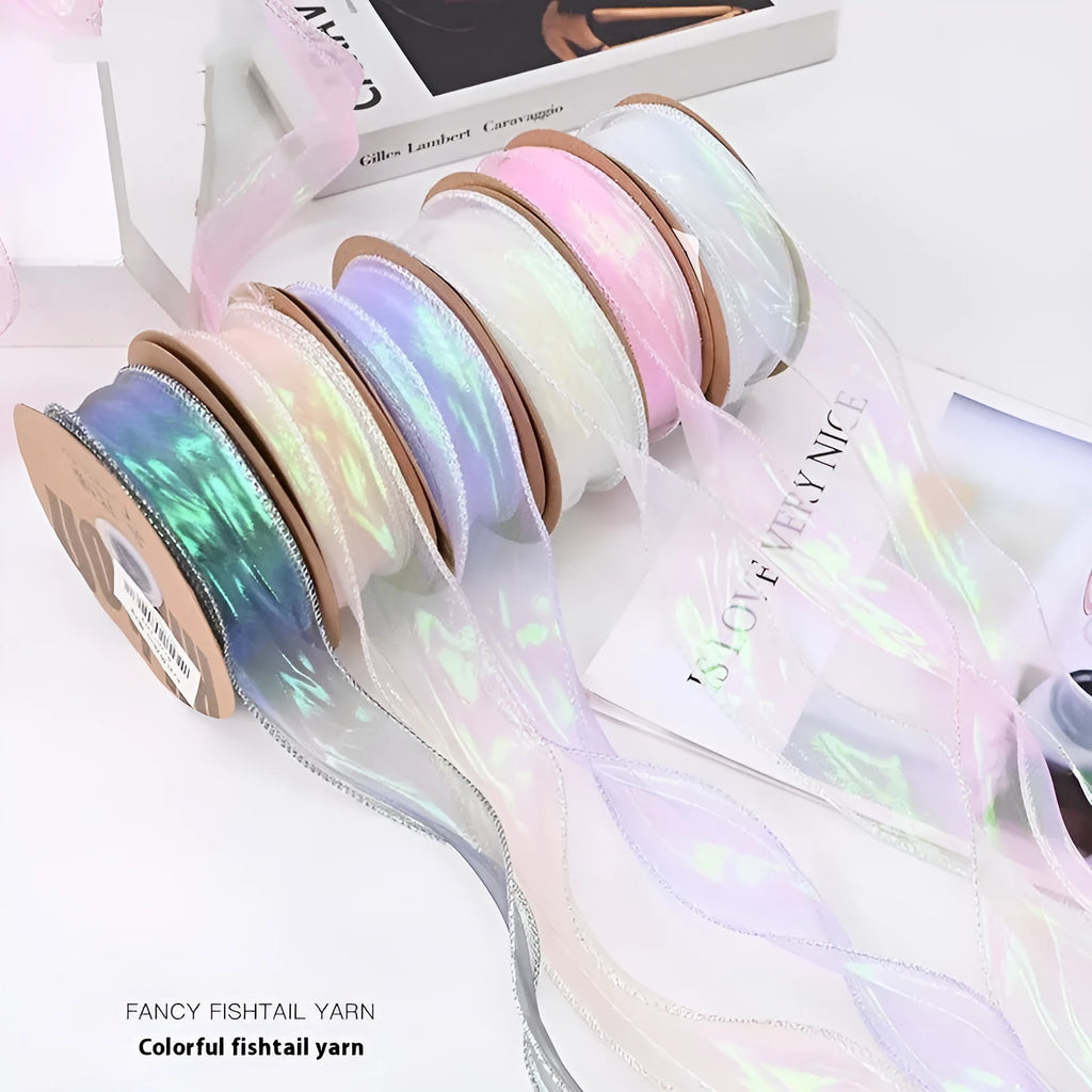 Roll of colourful mesh fishtail yarn wave ribbon with 4cm width for gift wrapping.