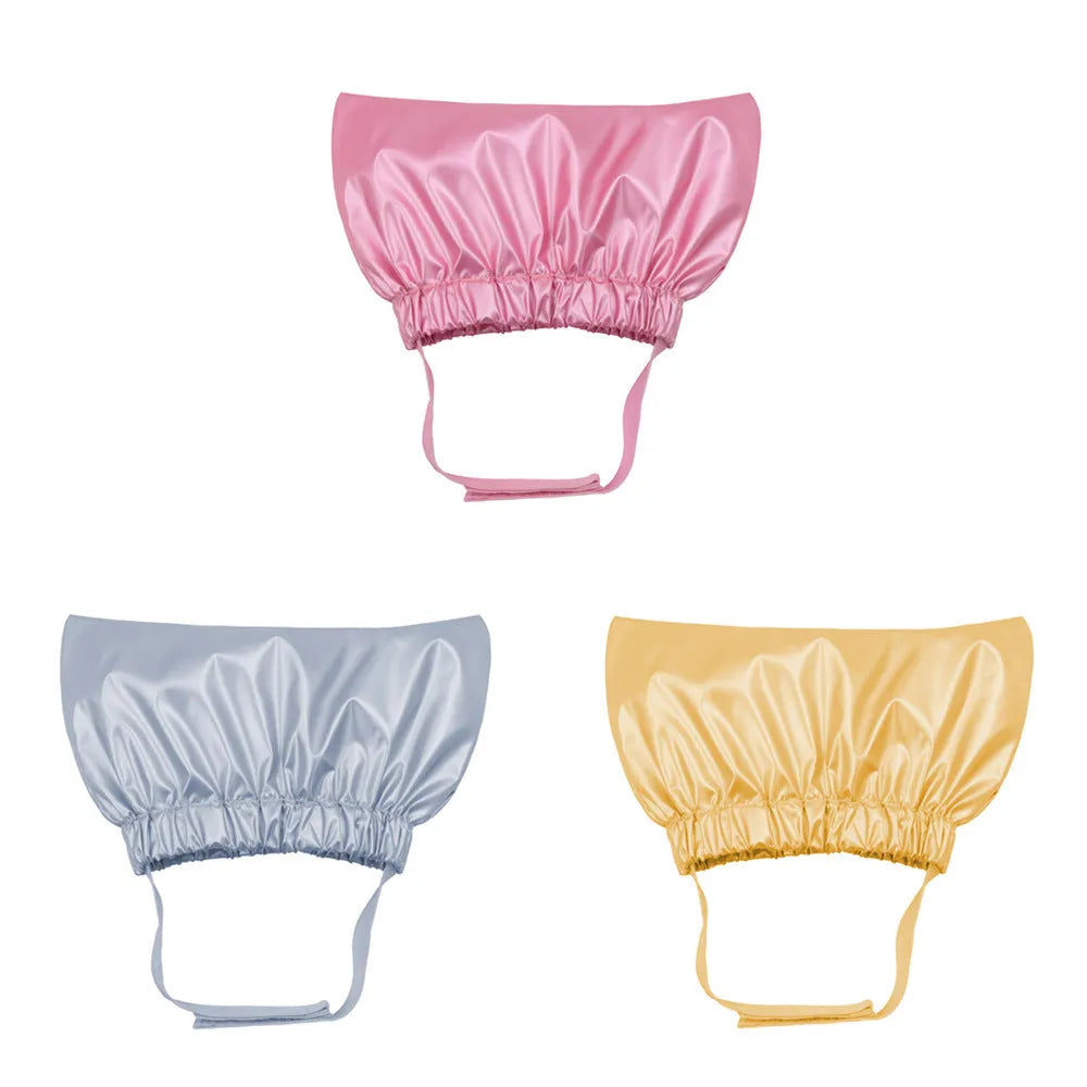 Adjustable ear-proof pet shower cap in silver colour showing non-woven fabric construction