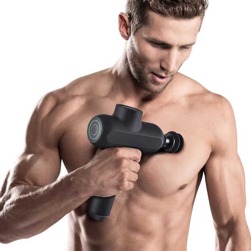 Black rechargeable muscle massager with six different coloured massage heads on a white background.