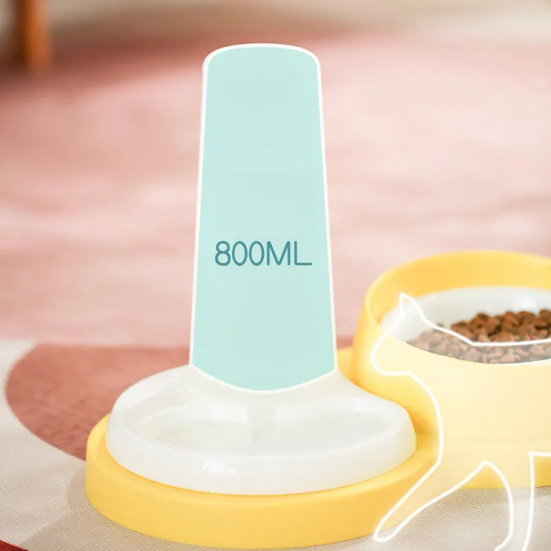 Grey and yellow double pet feeding bowl with ceramic food bowls and stainless steel water dish on a PP plastic base.