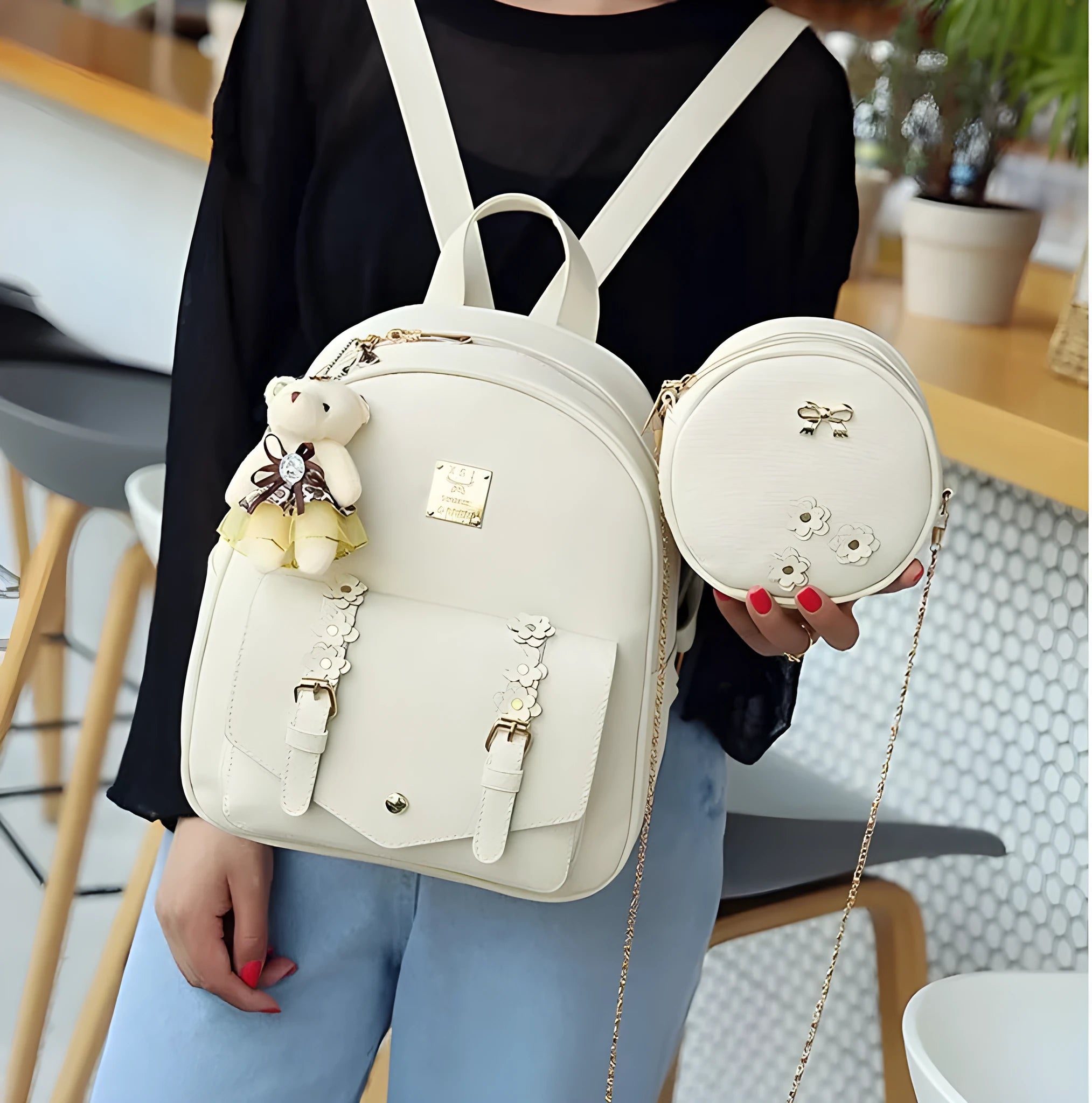 Women's three-piece PU leather bag set showing backpack, crossbody shoulder bag, and small card purse.