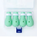 Set of four green silicone covers designed to fit over a cat's front paws.