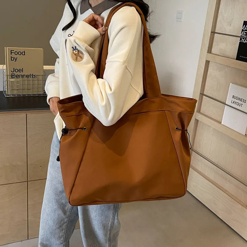 Soft foldable Oxford cloth tote bag in street trend style, shown in multiple colour options.