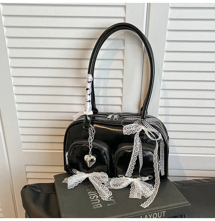 Beige PU shoulder bag with double straps and phone compartment showing structured square shape