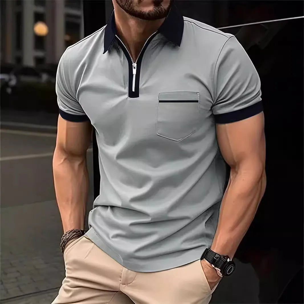 Men's casual short sleeve shirt with chest pocket and zipper decorations in a loose fit.
