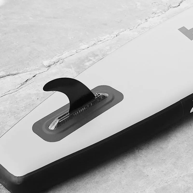 Heytur SUP paddle with large removable plastic fish fins and water dispenser feature.