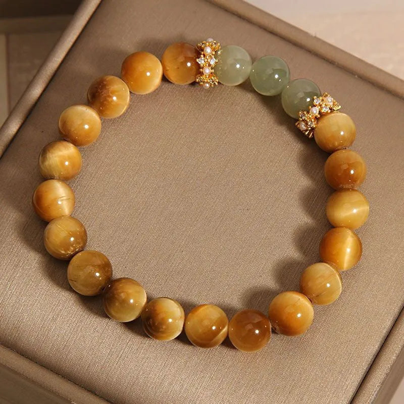 Natural yellow Tiger's Eye Hetian jade bracelet with gold gourd design and U-shaped form